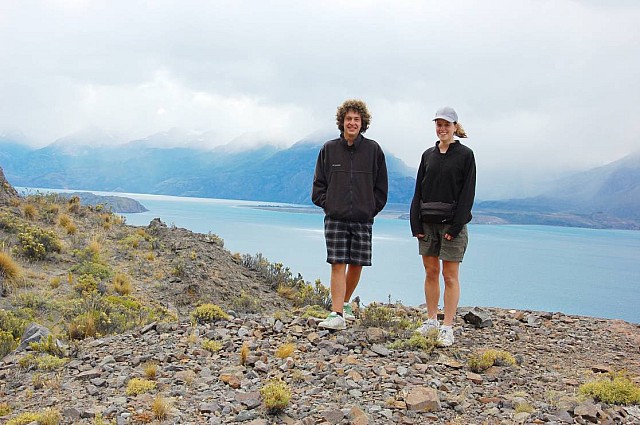 Next generation.  Edward and Brittany above Lago General Carrerra.  Mist shrouded lower peaks and ice cap in the background